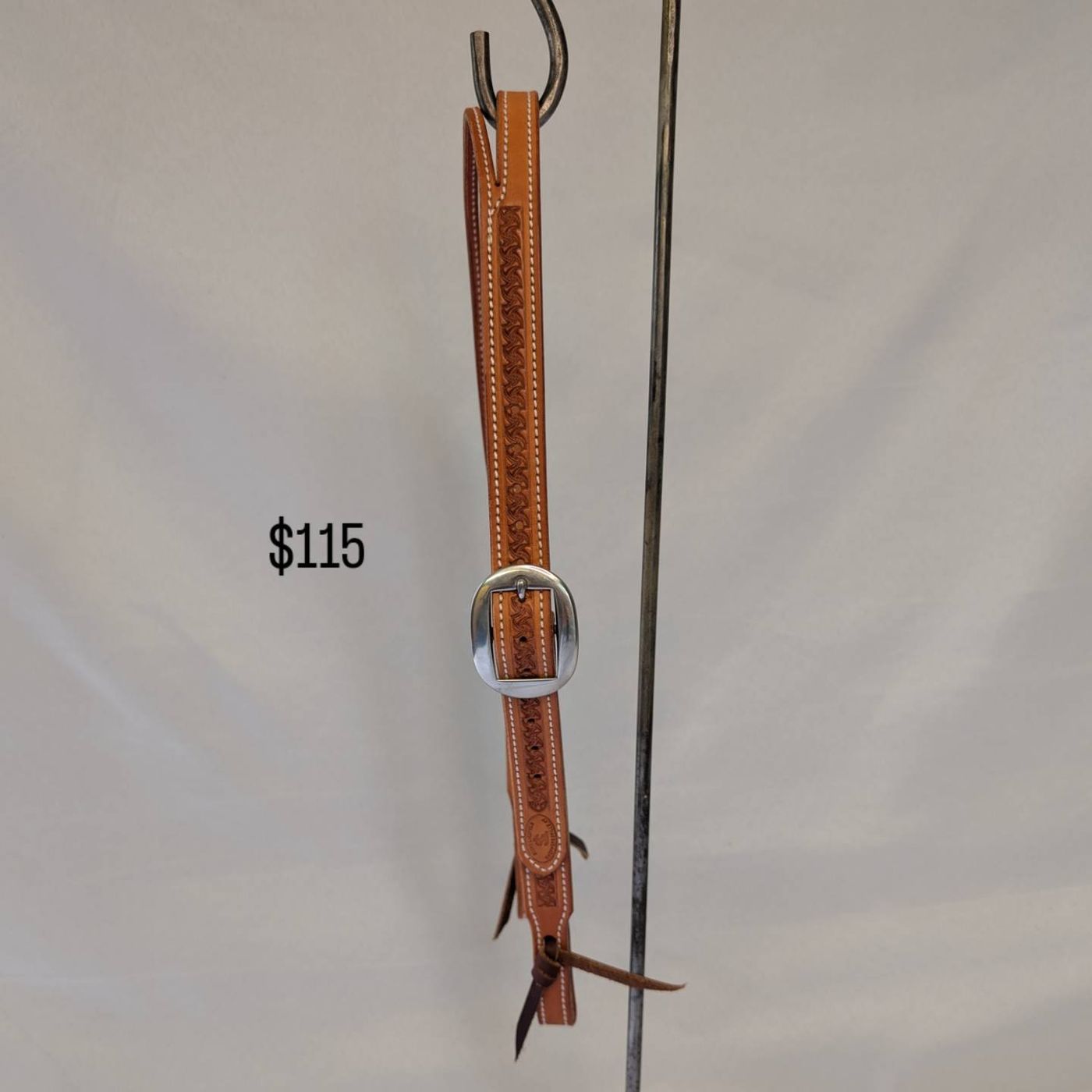 Light tan basket-stamped headstall with silver buckle